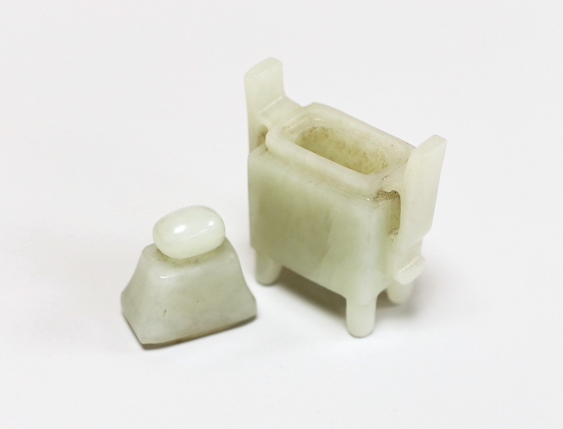 A Chinese pale celadon jade miniature ‘fanghu’ vessel, 6cms high